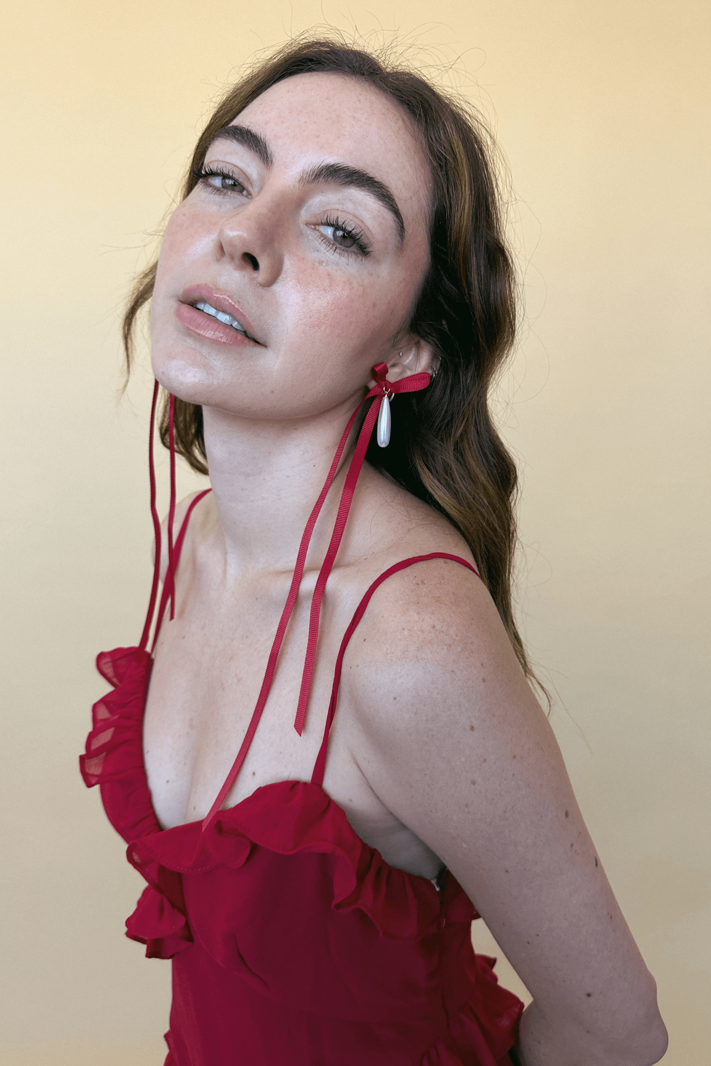 Long Bow Drop Pendant Earrings